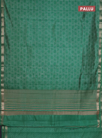 Semi raw silk saree green shade with allover geometric prints and zari woven border