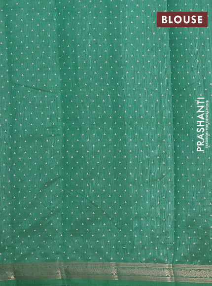 Semi raw silk saree green shade with allover geometric prints and zari woven border