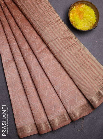 Semi raw silk saree pastel peach with allover geometric prints and zari woven border
