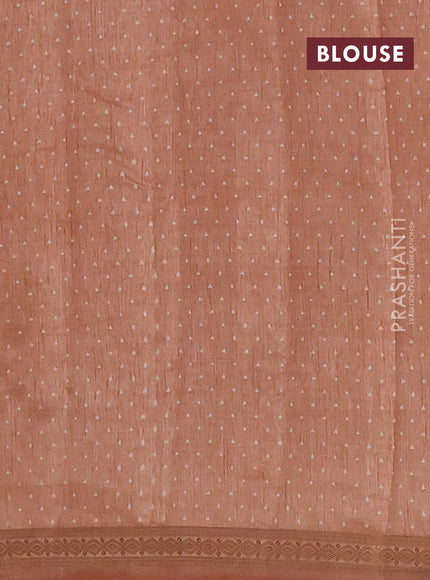 Semi raw silk saree pastel peach with allover geometric prints and zari woven border