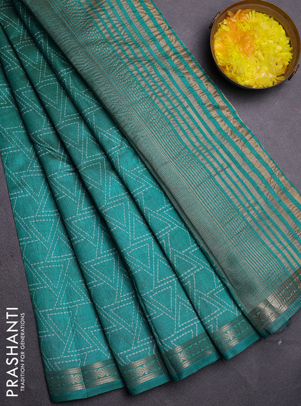 Semi raw silk saree teal blue with allover geometric prints and zari woven border