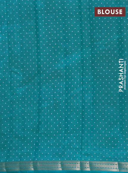 Semi raw silk saree teal blue with allover geometric prints and zari woven border