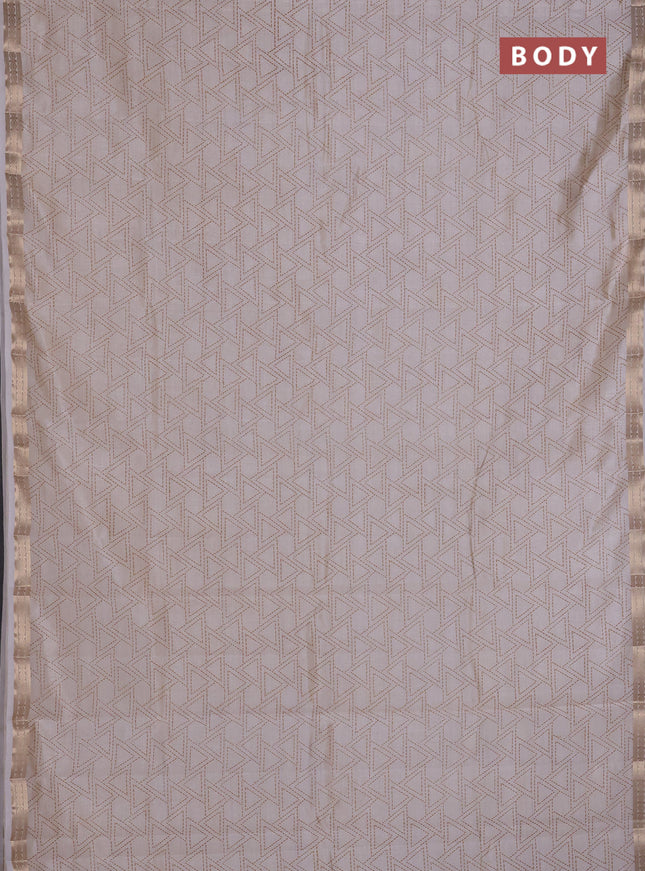 Semi raw silk saree cream with allover geometric prints and zari woven border
