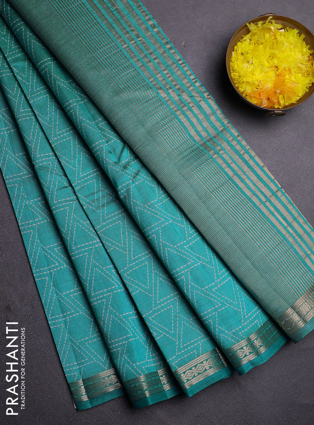 Semi raw silk saree teal blue with allover geometric prints and zari woven border