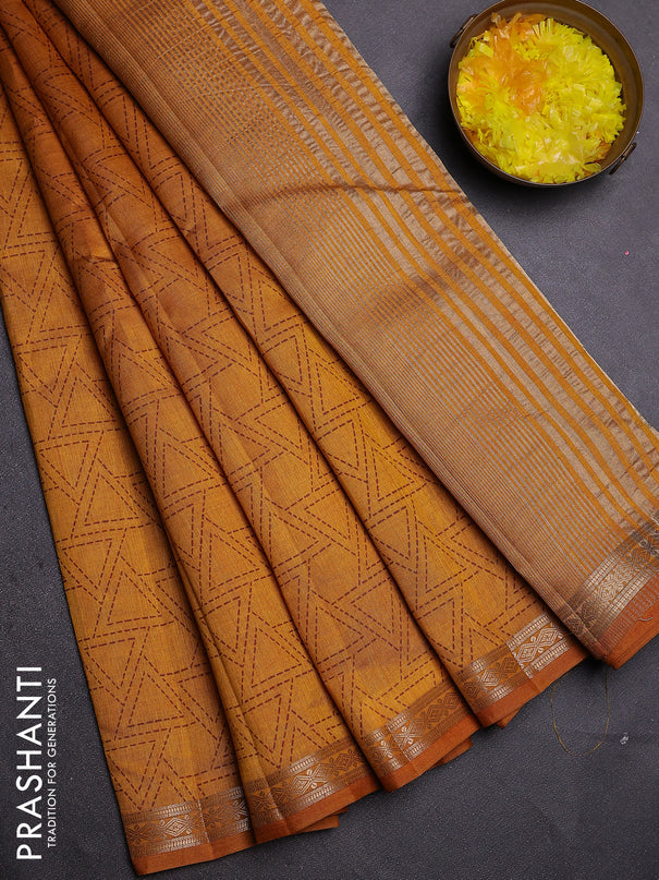 Semi raw silk saree mustard yellow with allover geometric prints and zari woven border