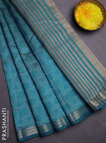 Semi raw silk saree cs blue with allover geometric prints and zari woven border