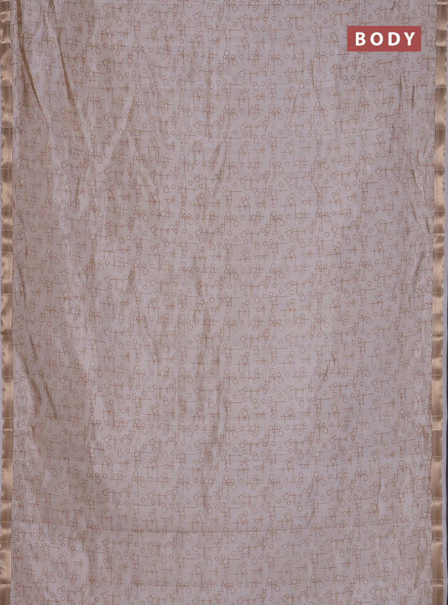Semi raw silk saree cream with allover geometric prints and zari woven border