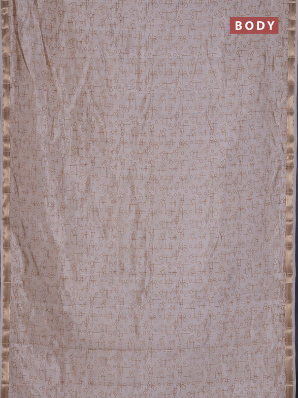 Semi raw silk saree cream with allover geometric prints and zari woven border