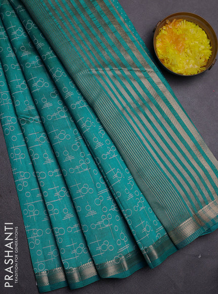Semi raw silk saree teal blue with allover geometric prints and zari woven border