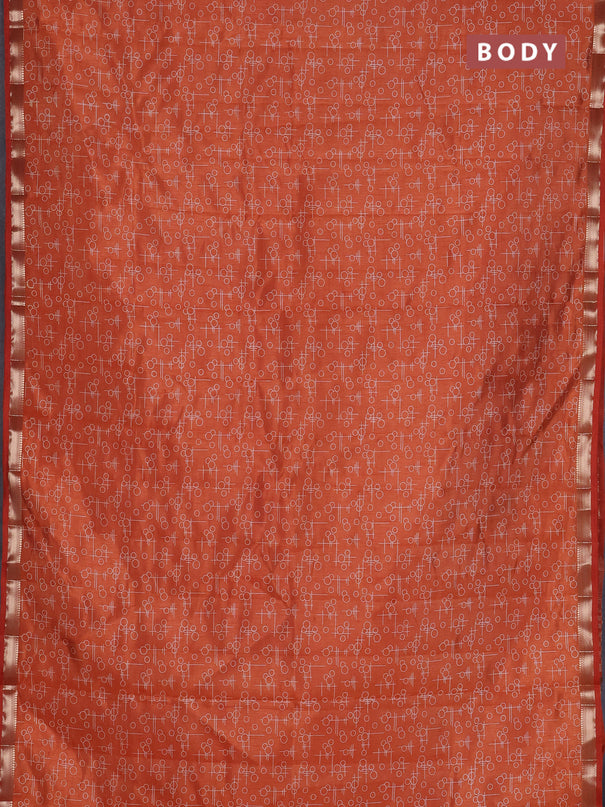 Semi raw silk saree rust shade with allover geometric prints and zari woven border