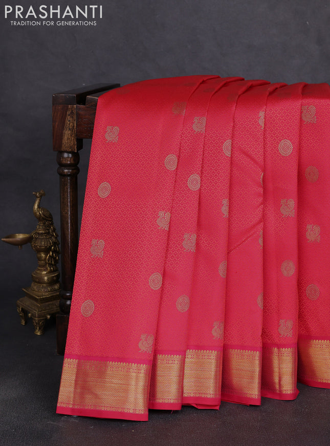 Pure kanchipuram silk saree pinkish orange with allover self embose zari woven buttas and zari woven border