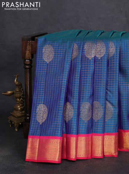 Pure kanchipuram silk saree dual shade of bluish green and red with allover zari checks & buttas and zari woven border