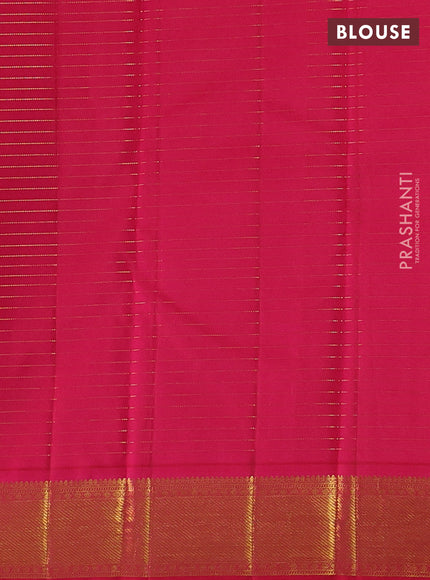 Pure kanchipuram silk saree dual shade of bluish green and red with allover zari checks & buttas and zari woven border