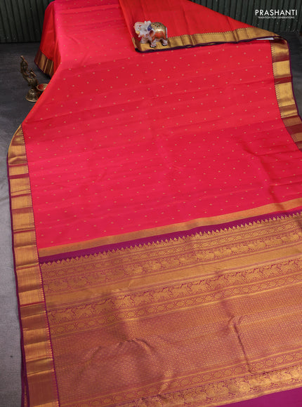 Pure kanchipuram silk saree pinkish orange and dark magenta pink with allover zari woven buttas and zari woven border