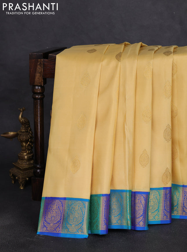 Pure kanchipuram silk saree cream and blue with zari woven buttas and zari woven border