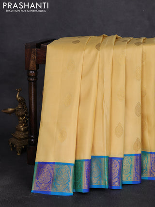 Pure kanchipuram silk saree cream and blue with zari woven buttas and zari woven border