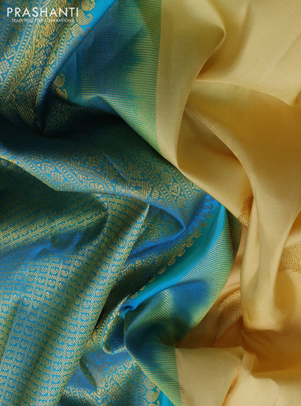 Pure kanchipuram silk saree cream and blue with zari woven buttas and zari woven border