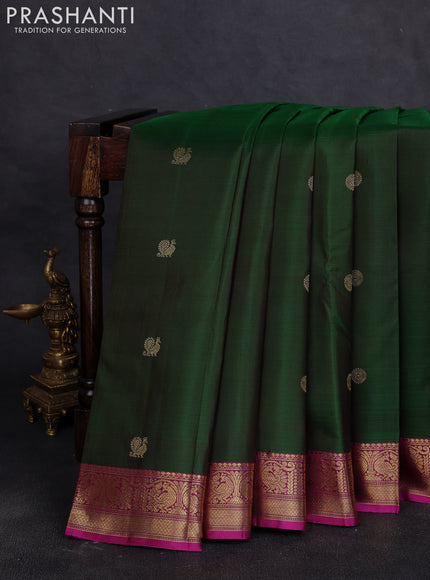Pure kanchipuram silk saree bottle green and dark pink with zari woven buttas and zari woven border