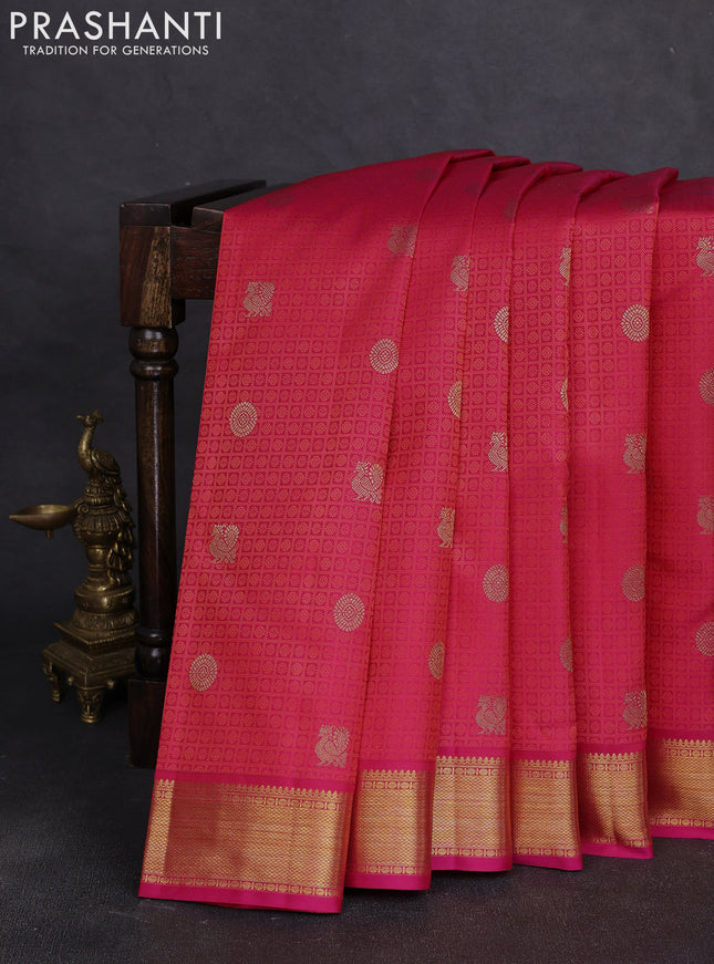 Pure kanchipuram silk saree pinkish orange and pink with allover self embose zari woven buttas and zari woven border