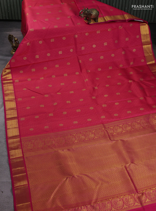 Pure kanchipuram silk saree pinkish orange and pink with allover self embose zari woven buttas and zari woven border