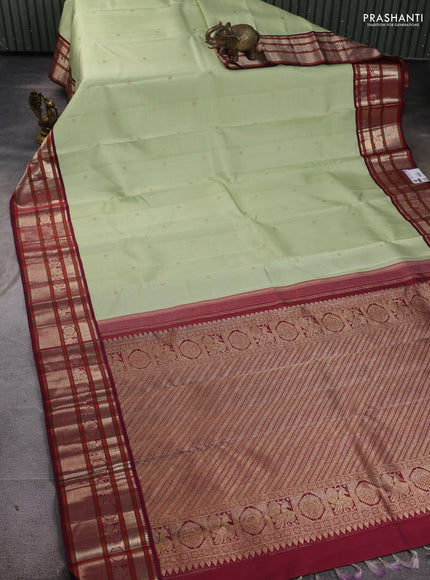 Pure kanchipuram silk saree pista green with allover vairaosi pattern & buttas and zari woven border