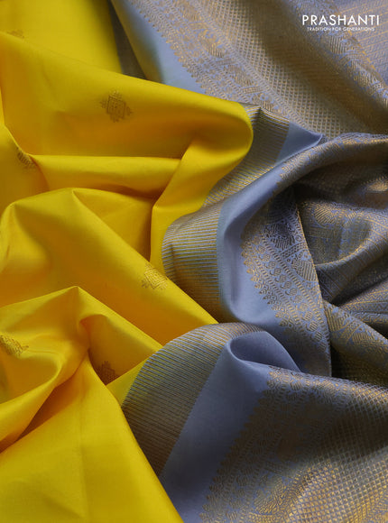 Pure kanchipuram silk saree yellow and grey with allover zari woven buttas and zaari woven korvai border