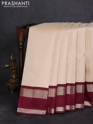 Pure kanchipuram silk saree off white and deep maroon with zari woven buttas and rettapet zari woven border