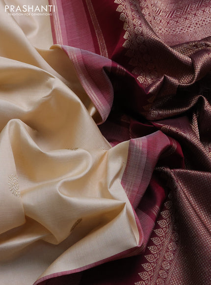 Pure kanchipuram silk saree off white and deep maroon with zari woven buttas and rettapet zari woven border