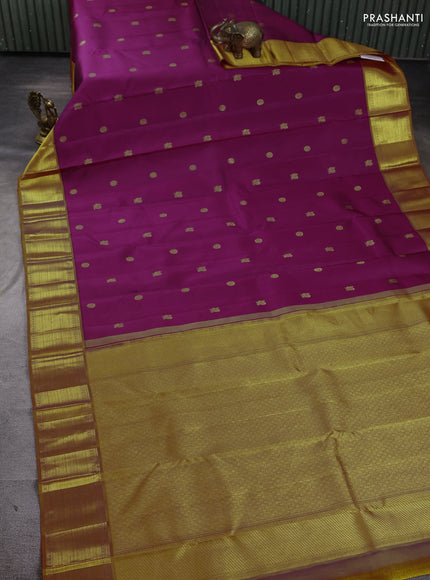 Pure kanchipuram silk saree magenta pink and mustard yellow with zari woven buttas and zari woven border