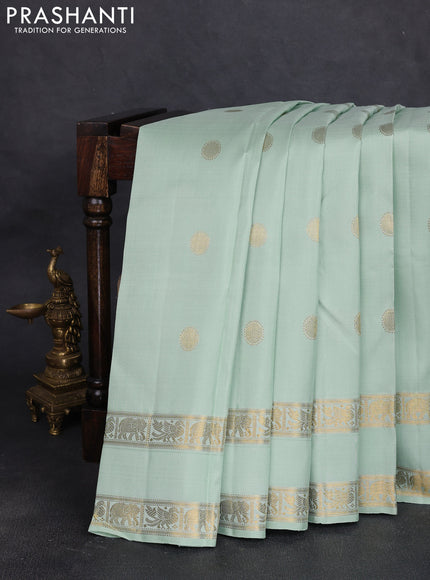 Pure kanchipuram silk saree pista green with zari woven buttas and rettapet zari woven border