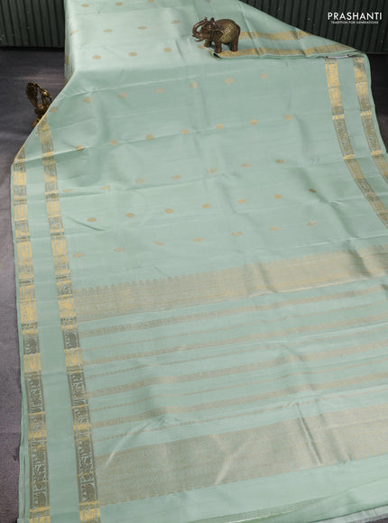 Pure kanchipuram silk saree pista green with zari woven buttas and rettapet zari woven border