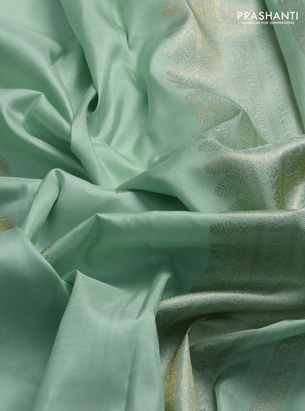 Pure kanchipuram silk saree pista green with zari woven buttas and rettapet zari woven border
