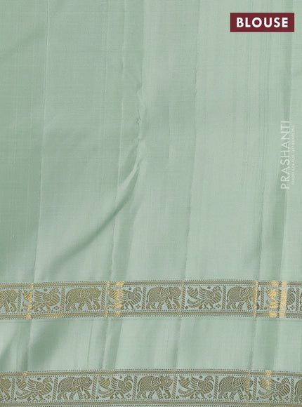 Pure kanchipuram silk saree pista green with zari woven buttas and rettapet zari woven border