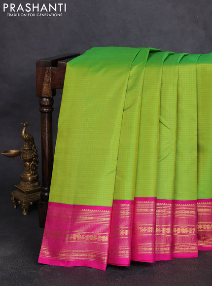 Pure kanchipuram silk saree fluorescent green and pink wwith allover zari small checked pattern and zazri woven border