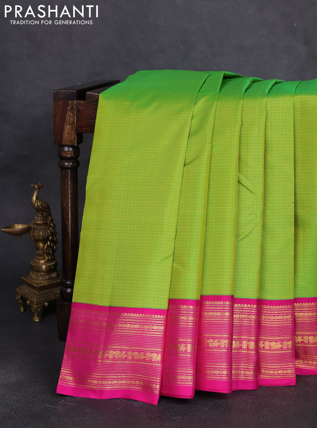 Pure kanchipuram silk saree fluorescent green and pink wwith allover zari small checked pattern and zazri woven border
