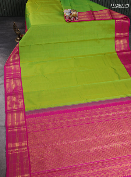 Pure kanchipuram silk saree fluorescent green and pink wwith allover zari small checked pattern and zazri woven border
