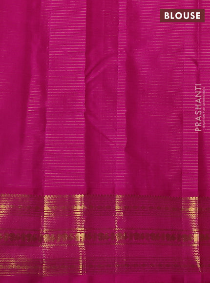 Pure kanchipuram silk saree fluorescent green and pink wwith allover zari small checked pattern and zazri woven border