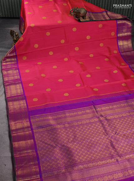 Pure kanchipuram silk saree dual shade of bluish pink and purple with allover ruddraksha zari woven buttas and zari woven border