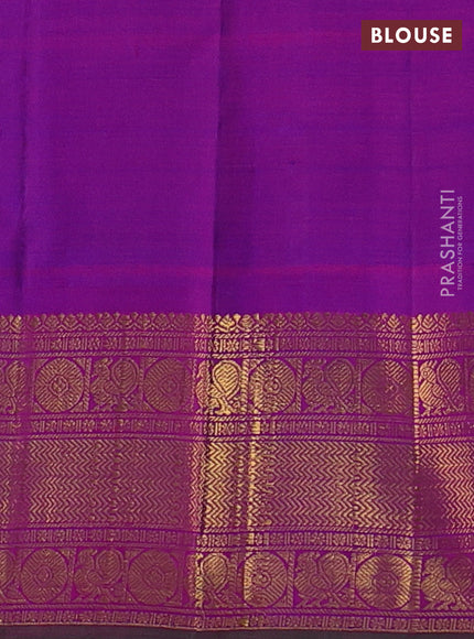 Pure kanchipuram silk saree dual shade of bluish pink and purple with allover ruddraksha zari woven buttas and zari woven border