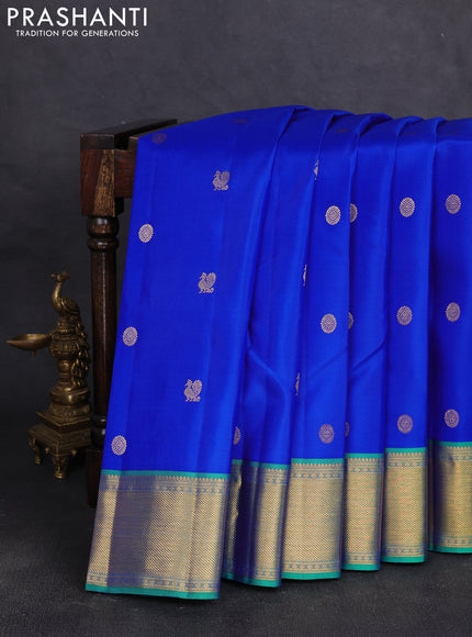 Pure kanchipuram silk saree royal blue and green shade with allover zari woven buttas and zari woven border