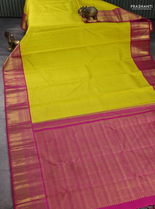 Pure kanchipuram silk saree lime yellow and pink with allover zari weaves and zari woven korvai border