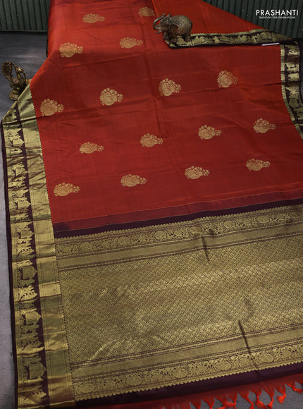 Pure kanchipuram silk saree rust shade and coffee brown with paisley zari woven buttas and zari woven border