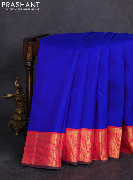 Pure kanchipuram silk saree royal blue and orange with plain body with allover rich zari woven border