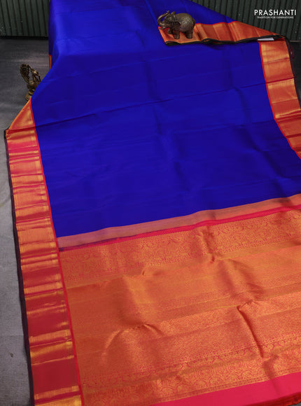 Pure kanchipuram silk saree royal blue and orange with plain body with allover rich zari woven border