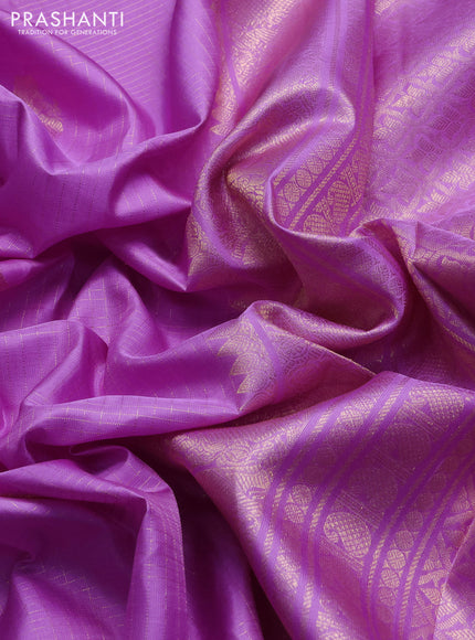 Pure kanchipuram silk saree purple with allover zari checks & buttas and zari woven border