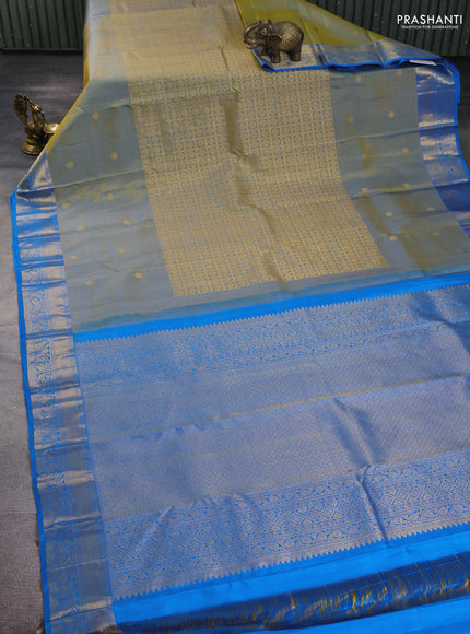 Pure kanchipuram silk saree dual shade of bluish yellow and cs blue with allover zari brocade weaves and long zari woven butta border