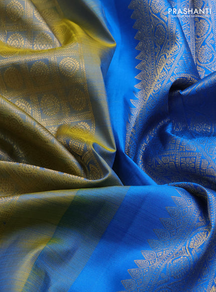 Pure kanchipuram silk saree dual shade of bluish yellow and cs blue with allover zari brocade weaves and long zari woven butta border