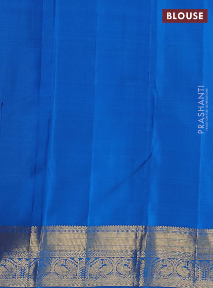 Pure kanchipuram silk saree dual shade of bluish yellow and cs blue with allover zari brocade weaves and long zari woven butta border