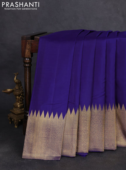 Pure kanchipuram silk saree blue and gold with plain body and temple rich zari woven border