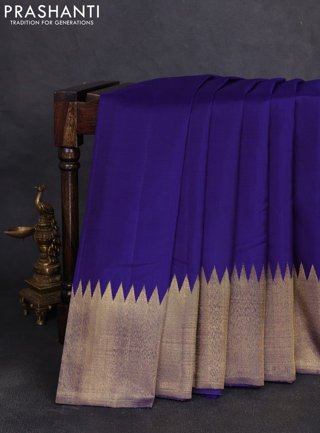 Pure kanchipuram silk saree blue and gold with plain body and temple rich zari woven border